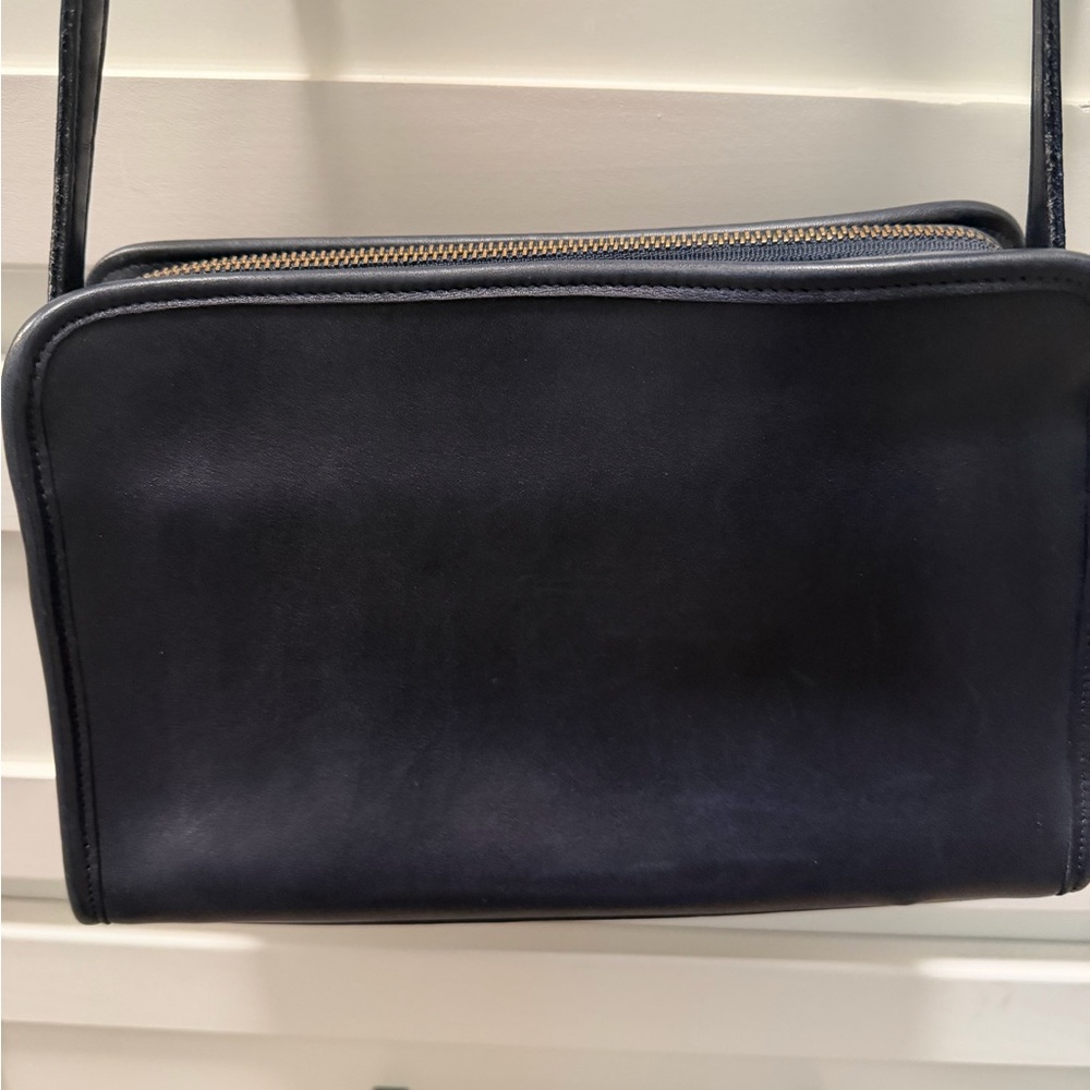 Coach women’s cross body handbag in navy